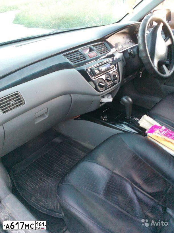 Фото автомобиля MITSUBISHI LANCER, 2004 — госномер А191РУ123. Цвет: ЧЕРНЫЙ