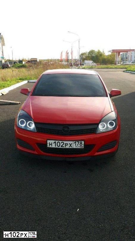 Фото автомобиля OPEL ASTRA, 2008 — госномер Е510ВН147. Цвет: Красный