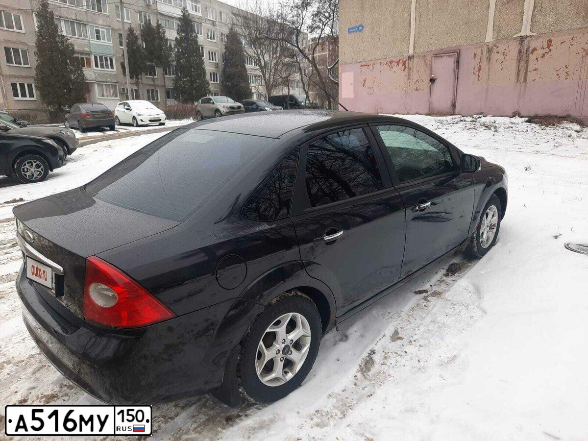 Фото автомобиля FORD FOCUS, 2009 — госномер Т107АВ181. Цвет: ЧЕРНЫЙ