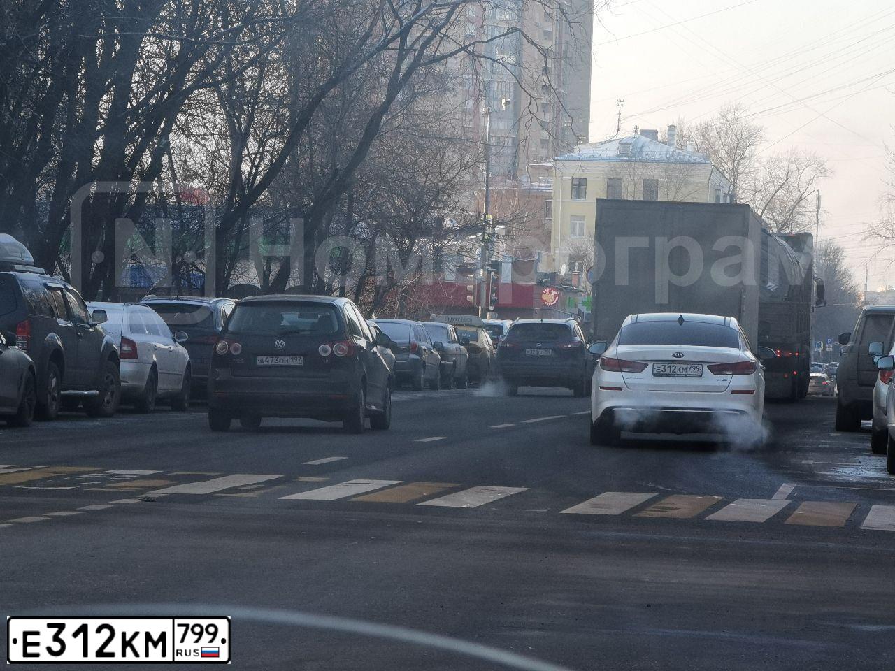 Фото автомобиля KIA MAGENTIS / OPTIMA, 2018 — госномер Е312КМ799. Цвет: Белый