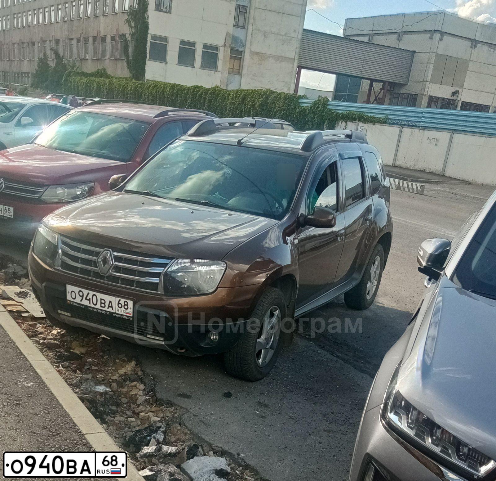 Фото автомобиля RENAULT DUSTER, 2012 — госномер О940ВА68. Цвет: Коричневый