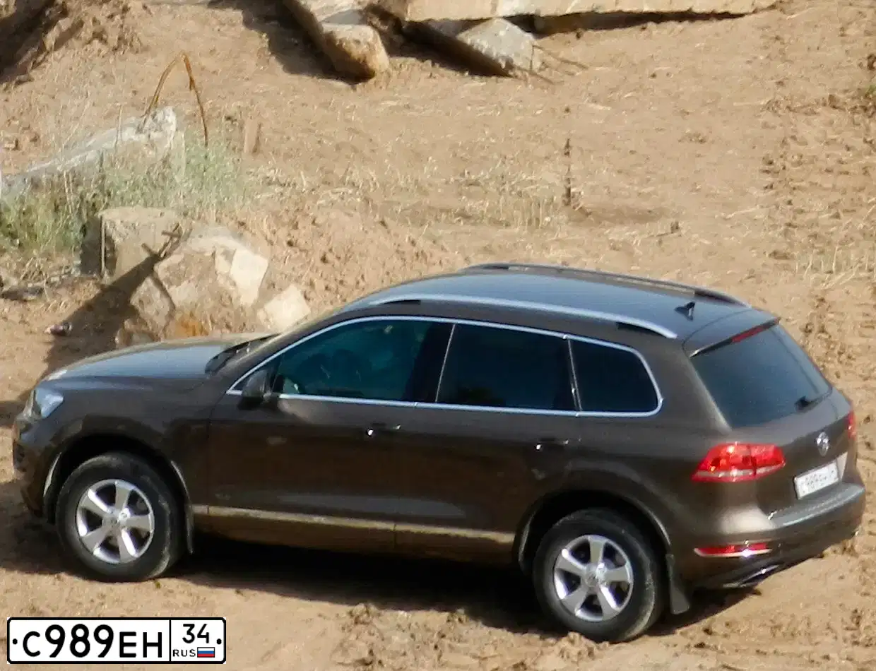 Фото автомобиля RENAULT DUSTER, 2012 — госномер С989УР34. Цвет: СВЕТЛО СЕРЫЙ