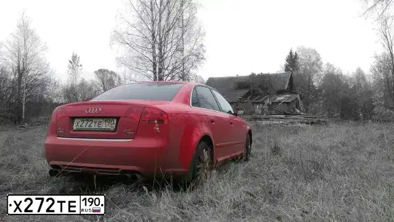 Фото автомобиля AUDI A4, 2006 — госномер О594ХР76. Цвет: Красный