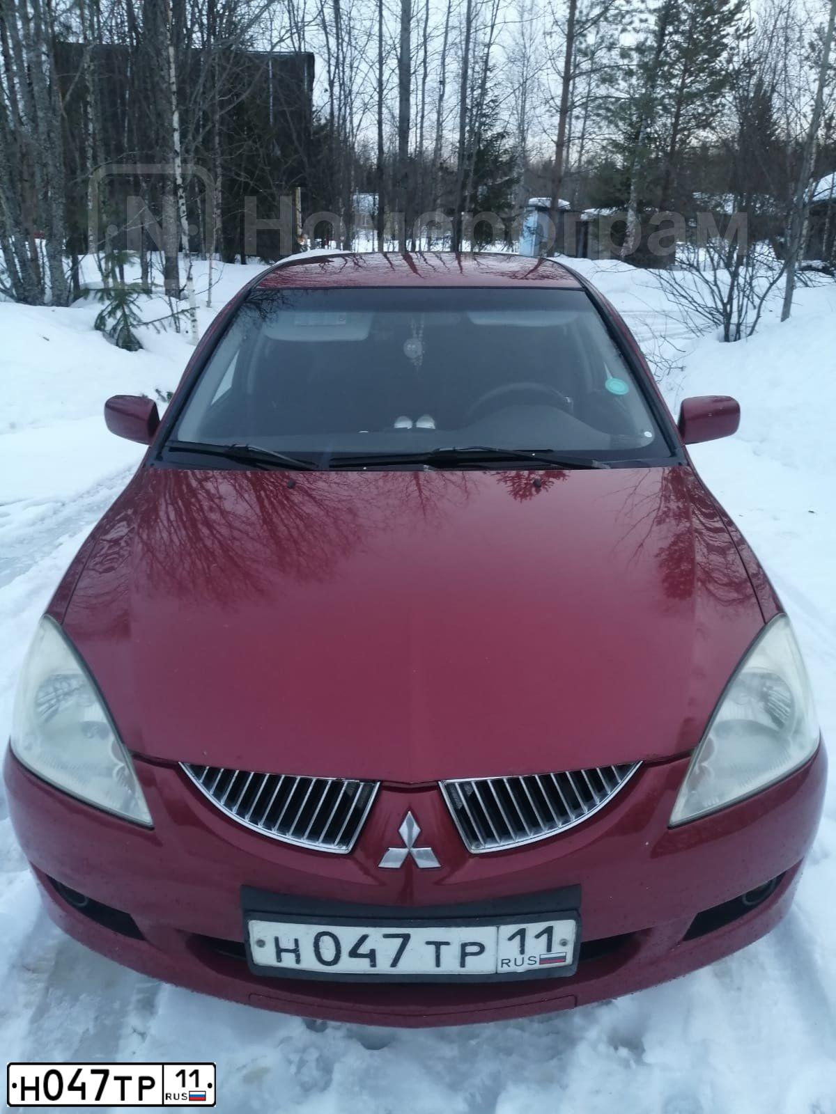 Фото автомобиля MITSUBISHI LANCER, 2005 — госномер Н047ТР11. Цвет: Красный