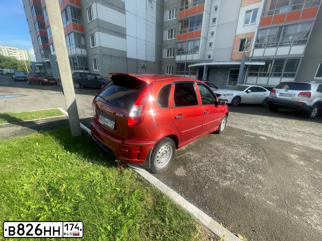 Фото автомобиля LADA 1119 KALINA, 2009 — госномер В826НН174. Цвет: СЕРЕБРИСТО-КРАСНЫЙ