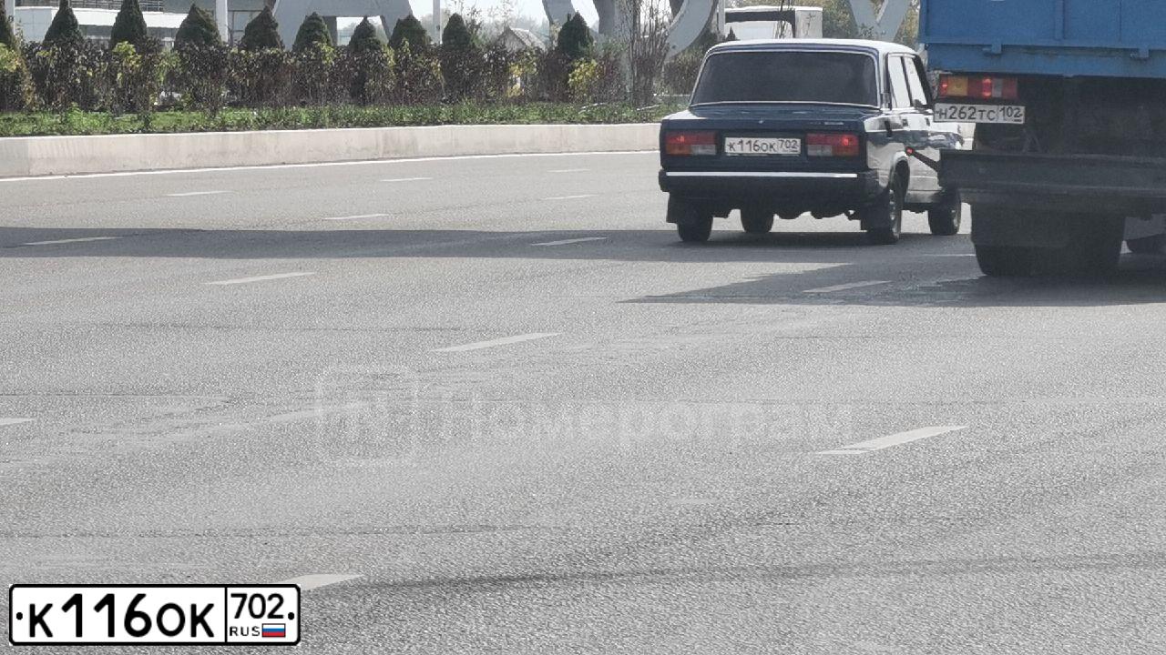 Фото автомобиля LADA 2107, 2009 — госномер К116ОК702. Цвет: сине-зеленый