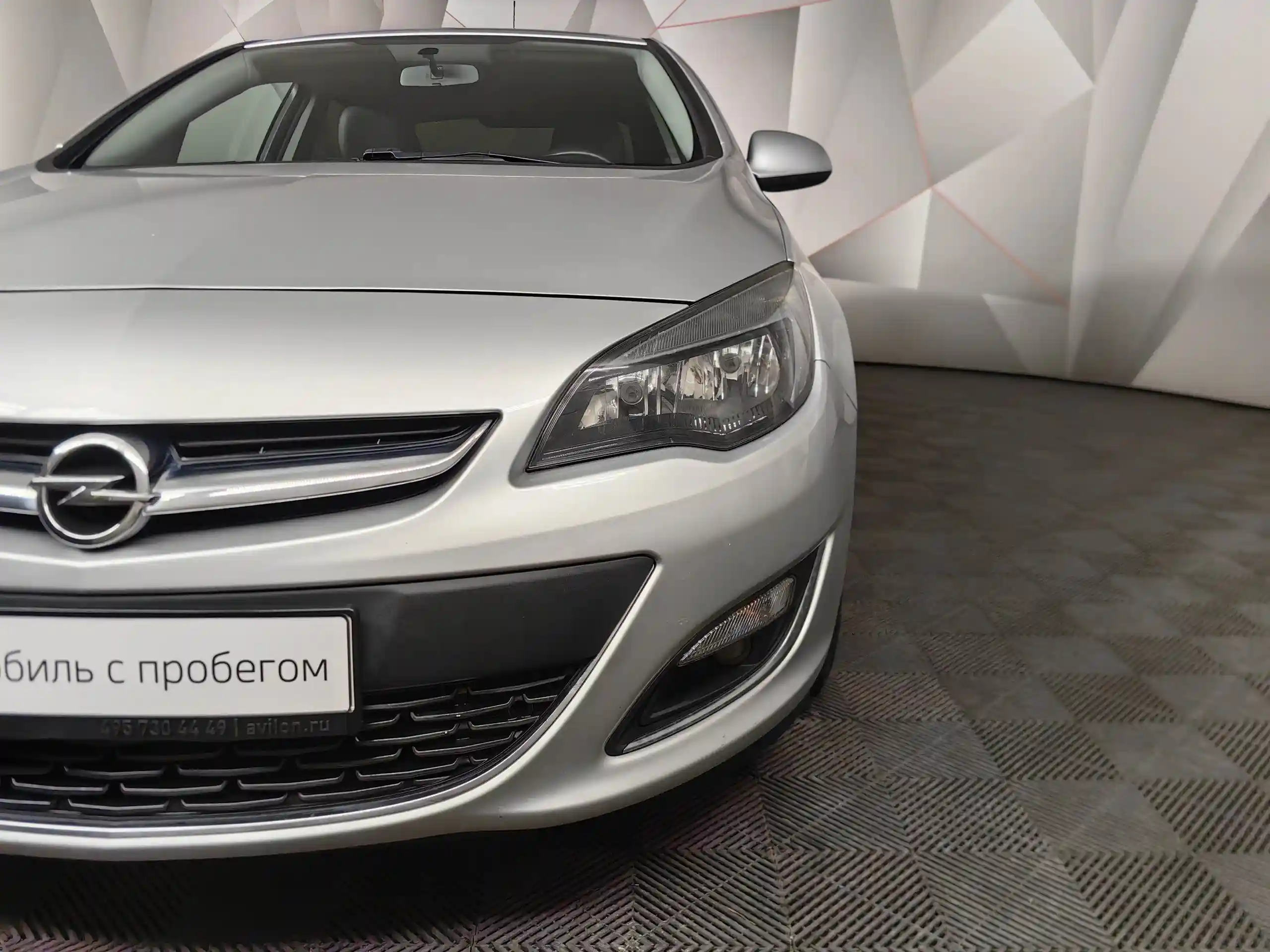 Фото автомобиля OPEL ASTRA, 2014 — госномер Е186ВХ550. Цвет: СЕРЫЙ