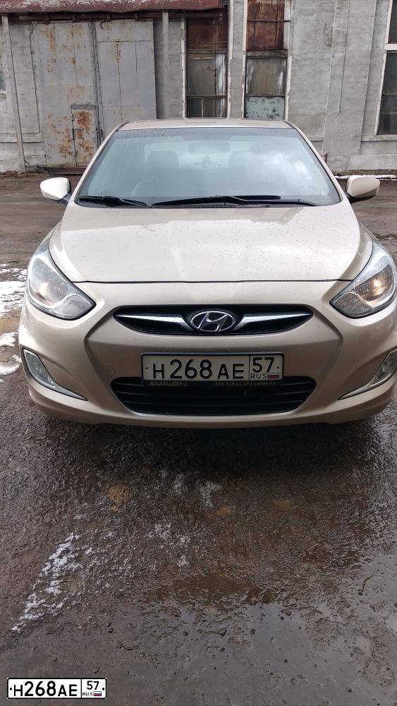 Фото автомобиля HYUNDAI SOLARIS, 2012 — госномер Н268АЕ57. Цвет: БЕЖЕВЫЙ