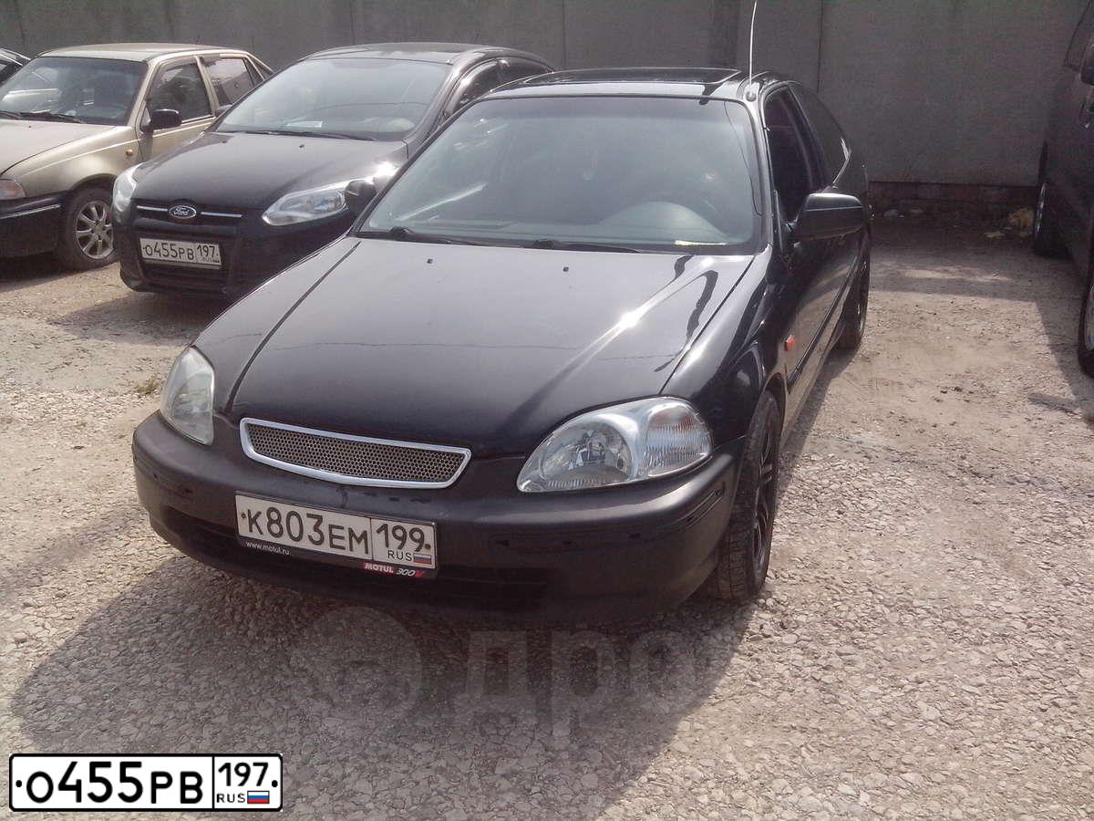 Фото автомобиля FORD FOCUS, 2011 — госномер Е483ОС790. Цвет: ЧЕРНЫЙ