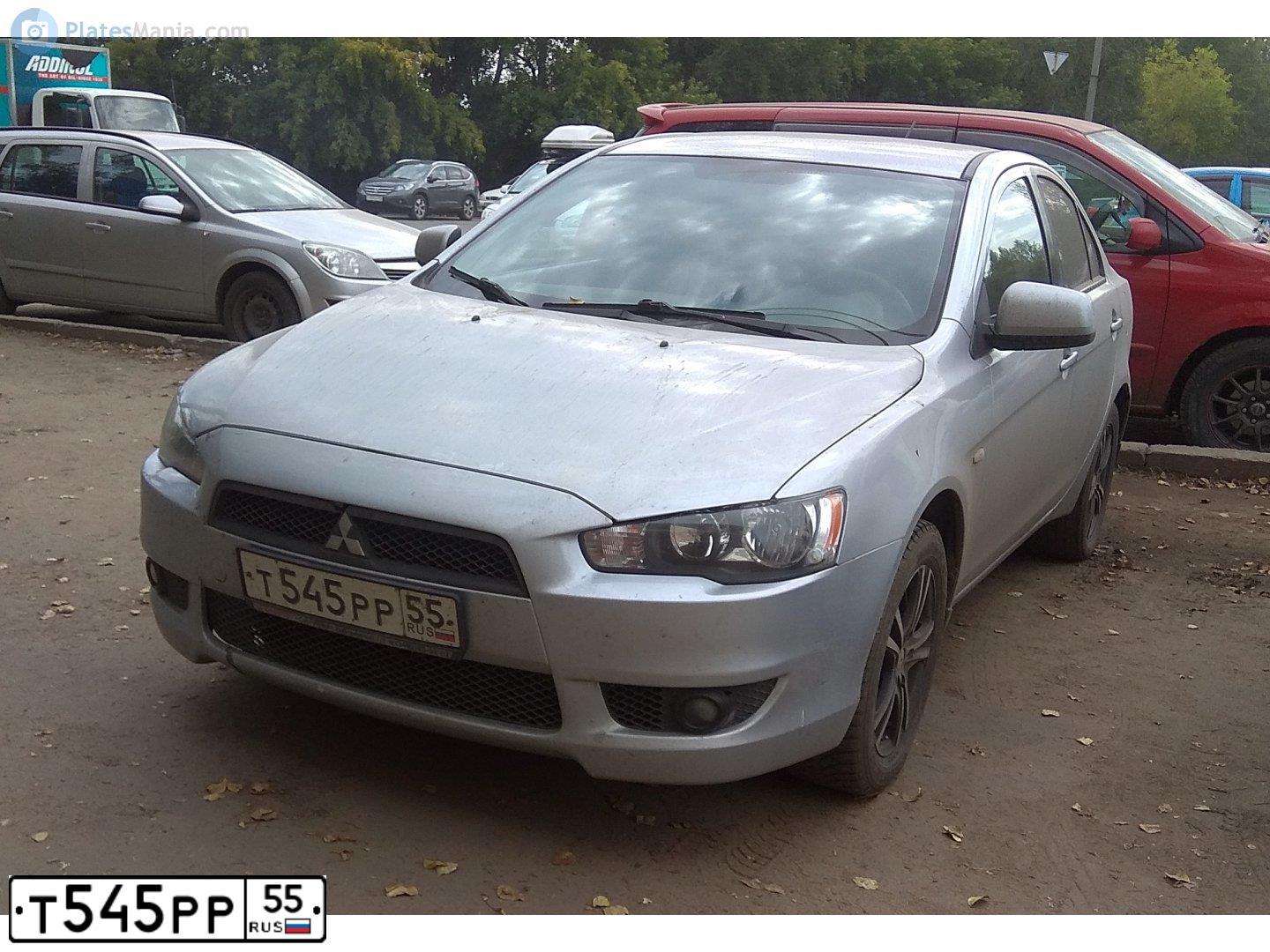 Фото автомобиля MITSUBISHI LANCER, 2010 — госномер Т545РР55. Цвет: Серебристый