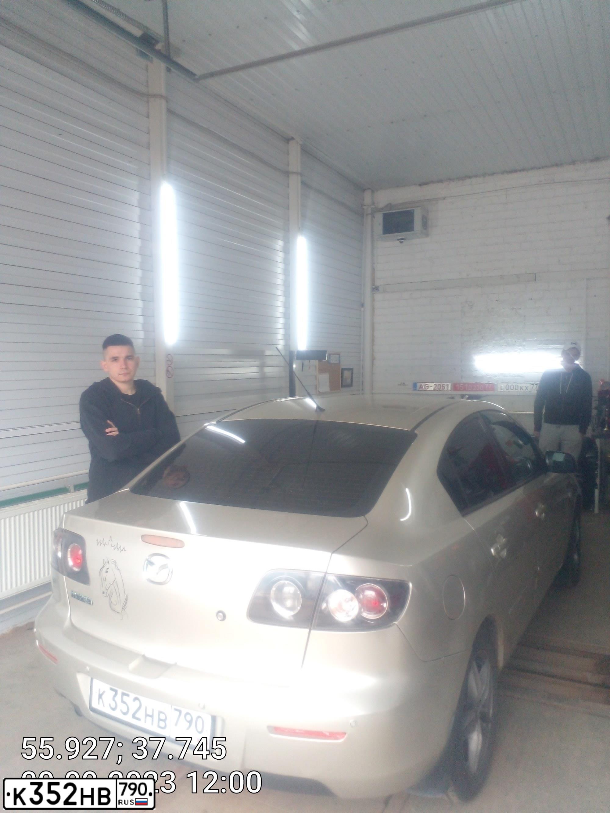 Фото автомобиля MAZDA 3, 2008 — госномер К352НВ790. Цвет: СЕРО-ЗОЛОТИСТЫЙ