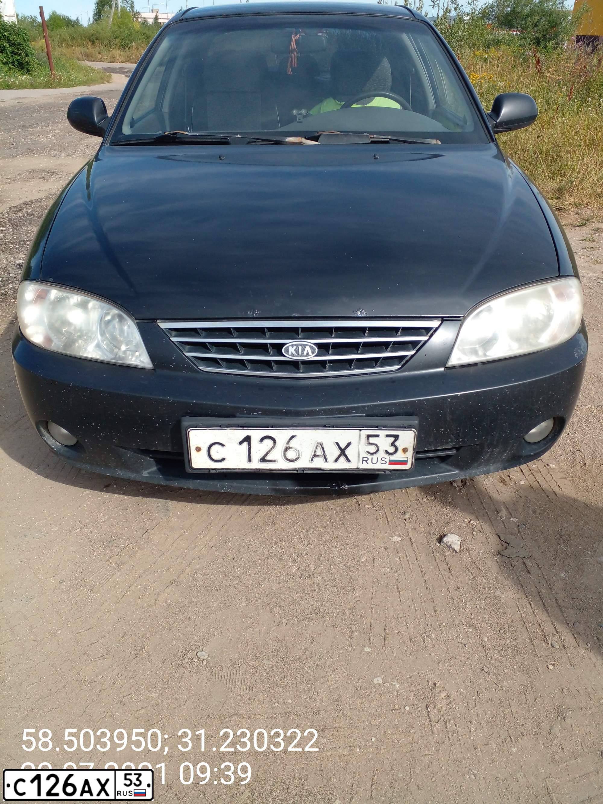 Фото автомобиля KIA SPECTRA, 2007 — госномер С126АХ53. Цвет: ЧЕРНЫЙ