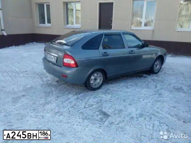 Фото автомобиля LADA 2172 PRIORA, 2008 — госномер А245ВН186. Цвет: СЕРО-ЗЕЛЕНЫЙ МЕТ.