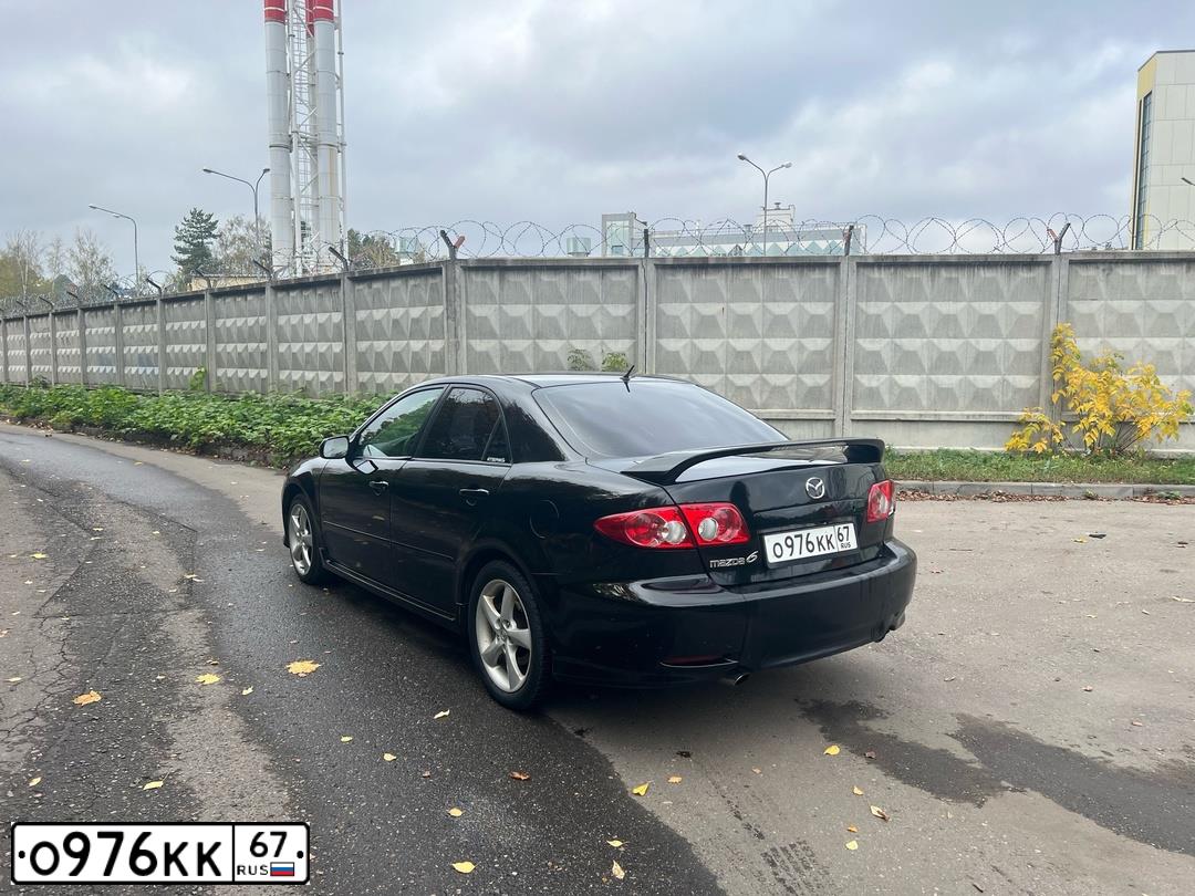 Фото автомобиля MAZDA 6, 2005 — госномер О976КК67. Цвет: ЧЕРНЫЙ