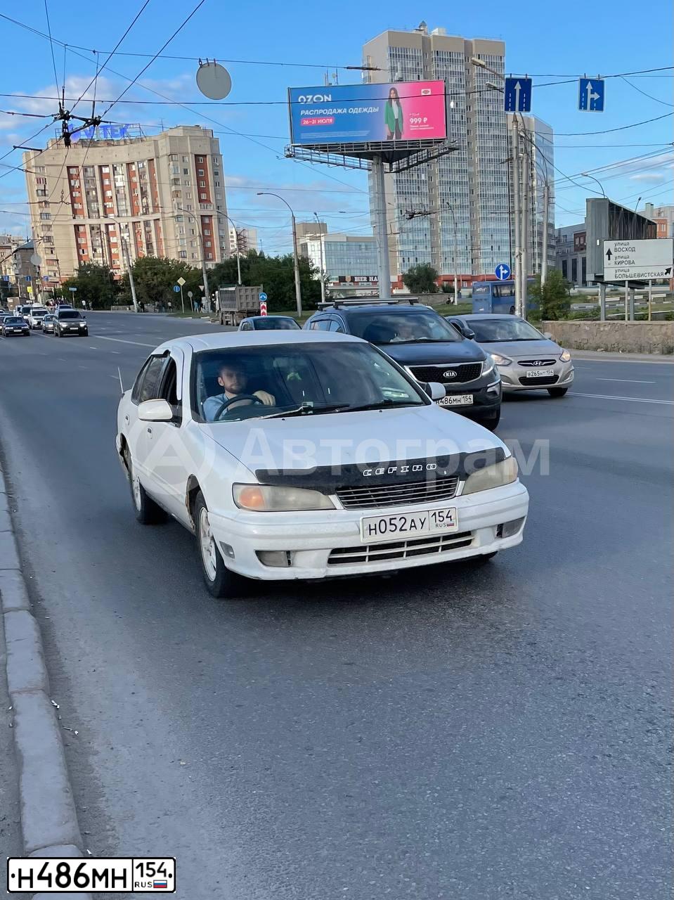 Фото автомобиля KIA SPORTAGE, 2014 — госномер Н486МН154. Цвет: ЧЕРНЫЙ