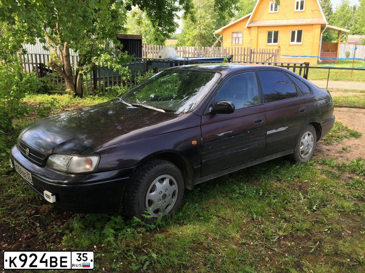 Фото автомобиля TOYOTA CARINA, 1993 — госномер К924ВЕ35. Цвет: ФИОЛЕТОВЫЙ