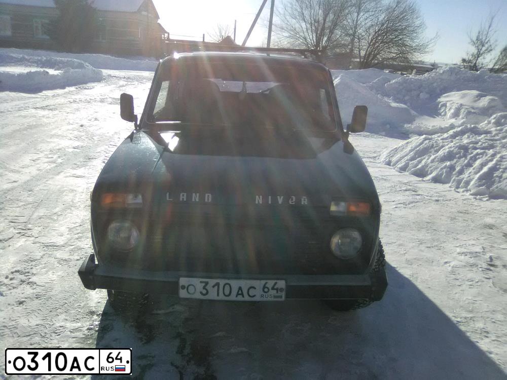 Фото автомобиля LADA 2121 NIVA, 1999 — госномер Е090ХА73. Цвет: синий