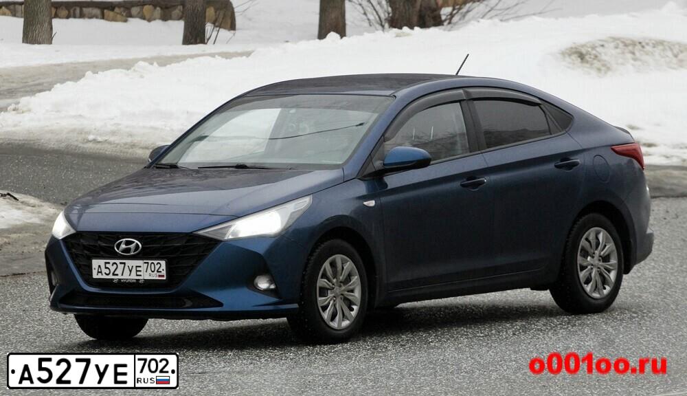 Фото автомобиля KIA RIO, 2016 — госномер Н040МТ702. Цвет: ТЕМНО СЕРЫЙ