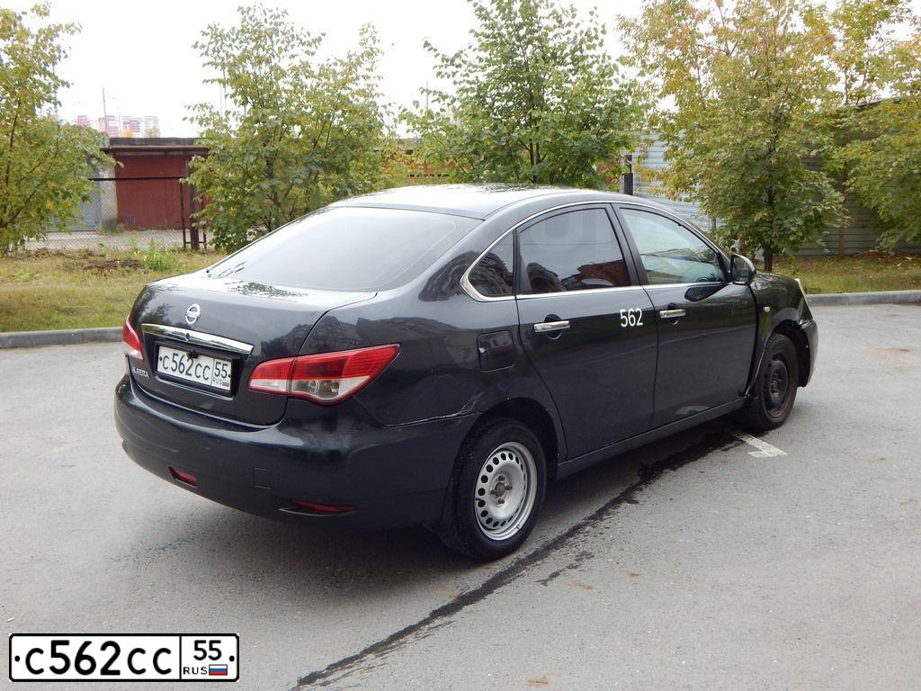 Фото автомобиля NISSAN ALMERA /AVTOVAZ/, 2014 — госномер У004ТВ72. Цвет: ЧЕРНЫЙ
