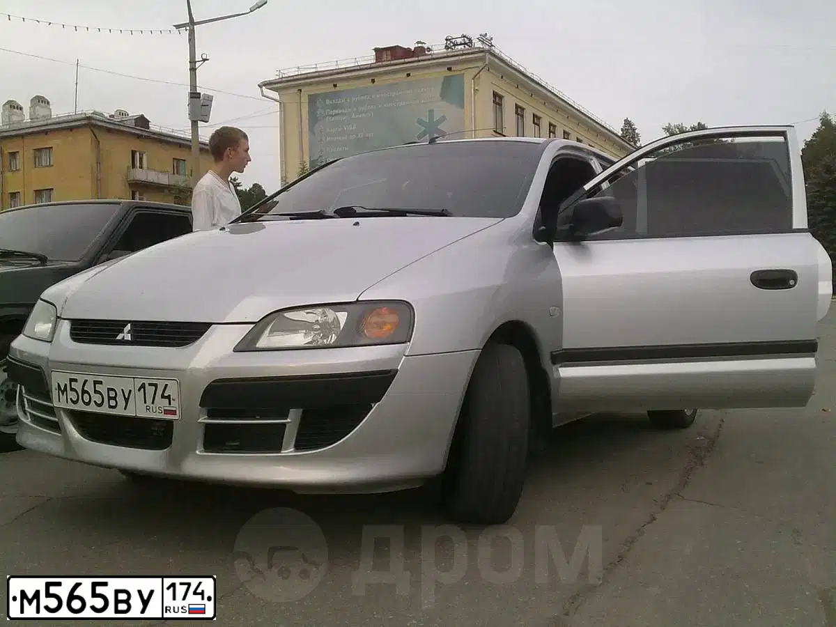 Фото автомобиля MITSUBISHI SPACE STAR, 2004 — госномер Т067СТ174. Цвет: СЕРЕБРИСТЫЙ