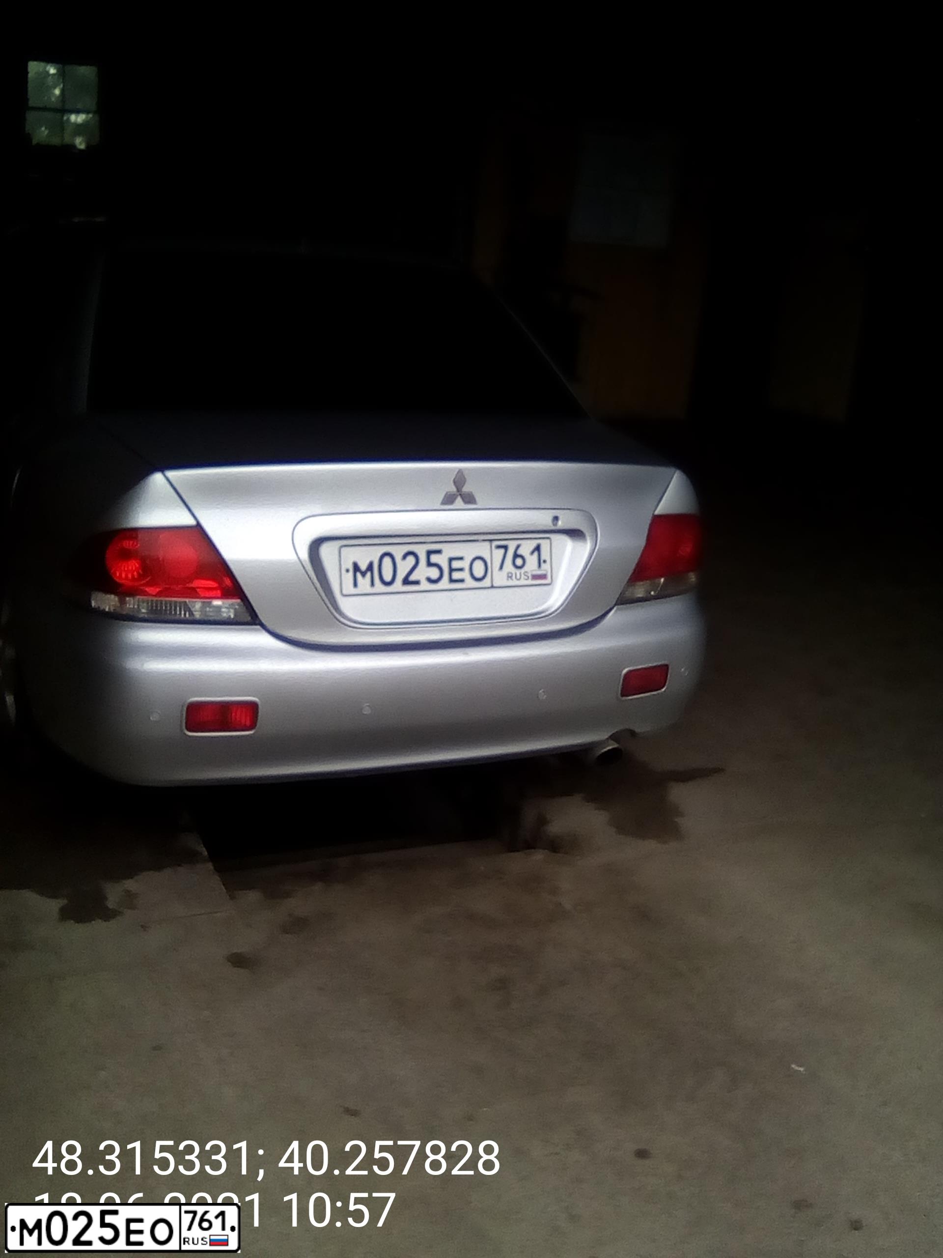 Фото автомобиля MITSUBISHI LANCER, 2004 — госномер К223ЕР180. Цвет: СЕРЕБРИСТЫЙ