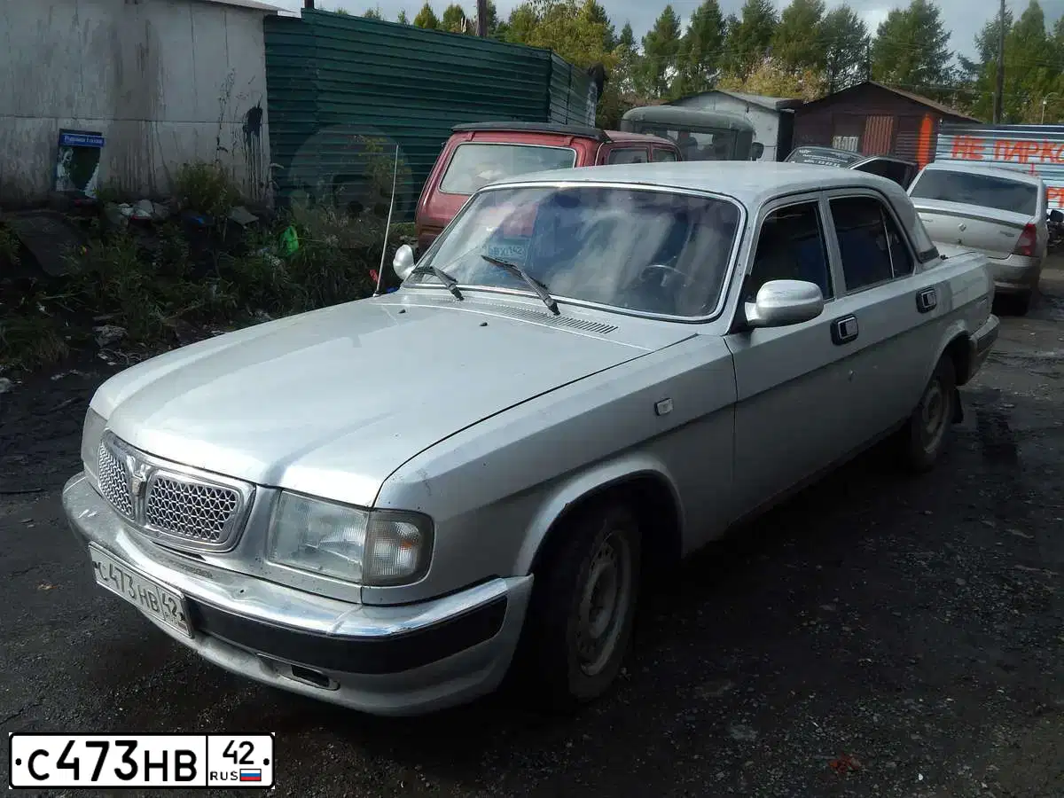 Фото автомобиля GAZ 3110 WOLGA, 2003 — госномер В473МН142. Цвет: БУРАН