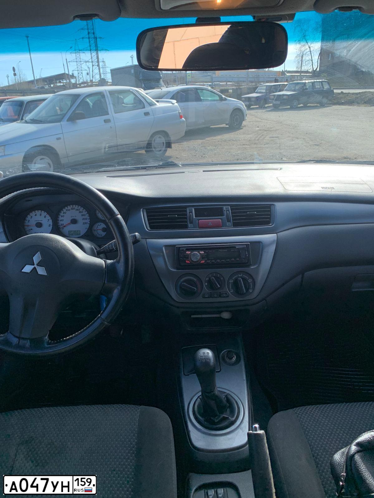 Фото автомобиля MITSUBISHI LANCER, 2007 — госномер Р620НС159. Цвет: Серый