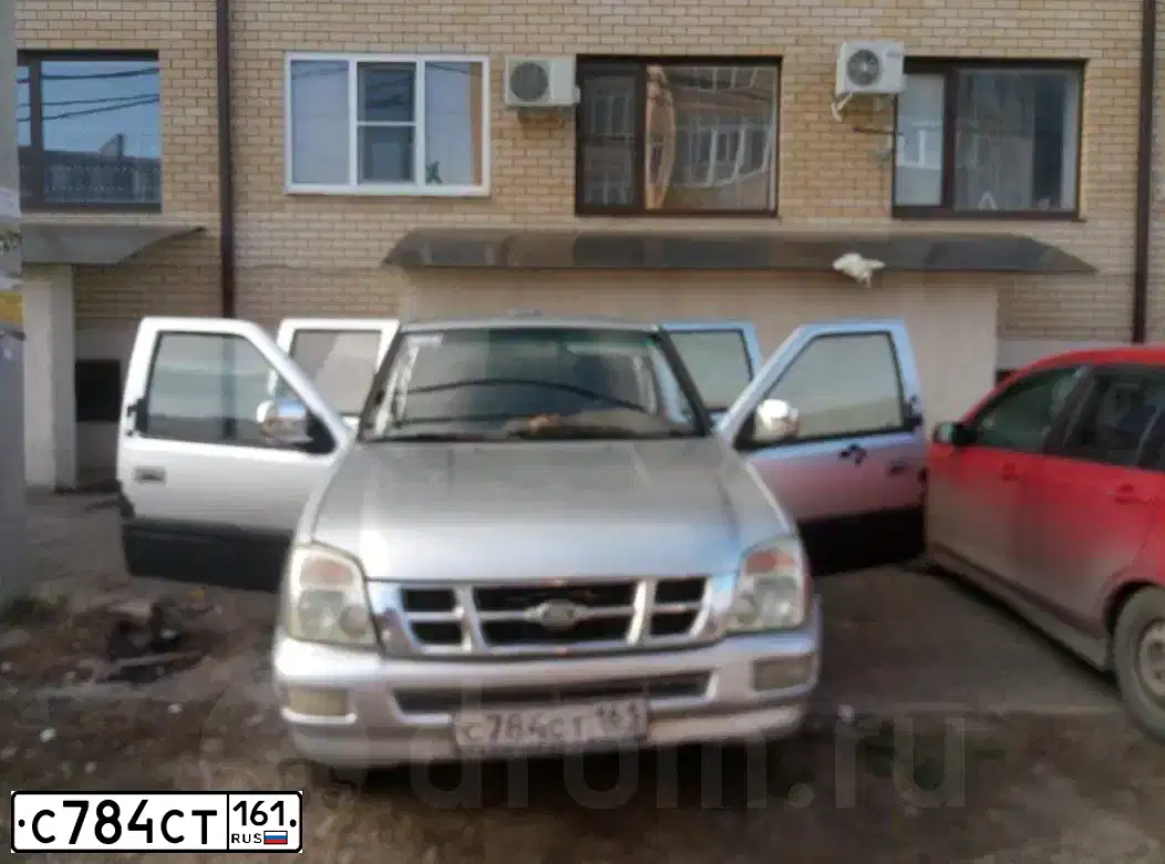 Фото автомобиля XINKAI NXK 1021, 2004 — госномер С784СТ161. Цвет: СЕРЫЙ