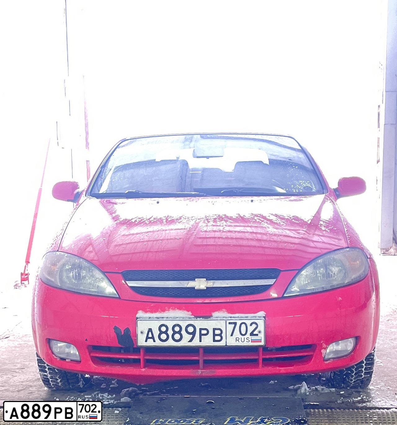 Фото автомобиля CHEVROLET LACETTI, 2007 — госномер А889РВ702. Цвет: Красный
