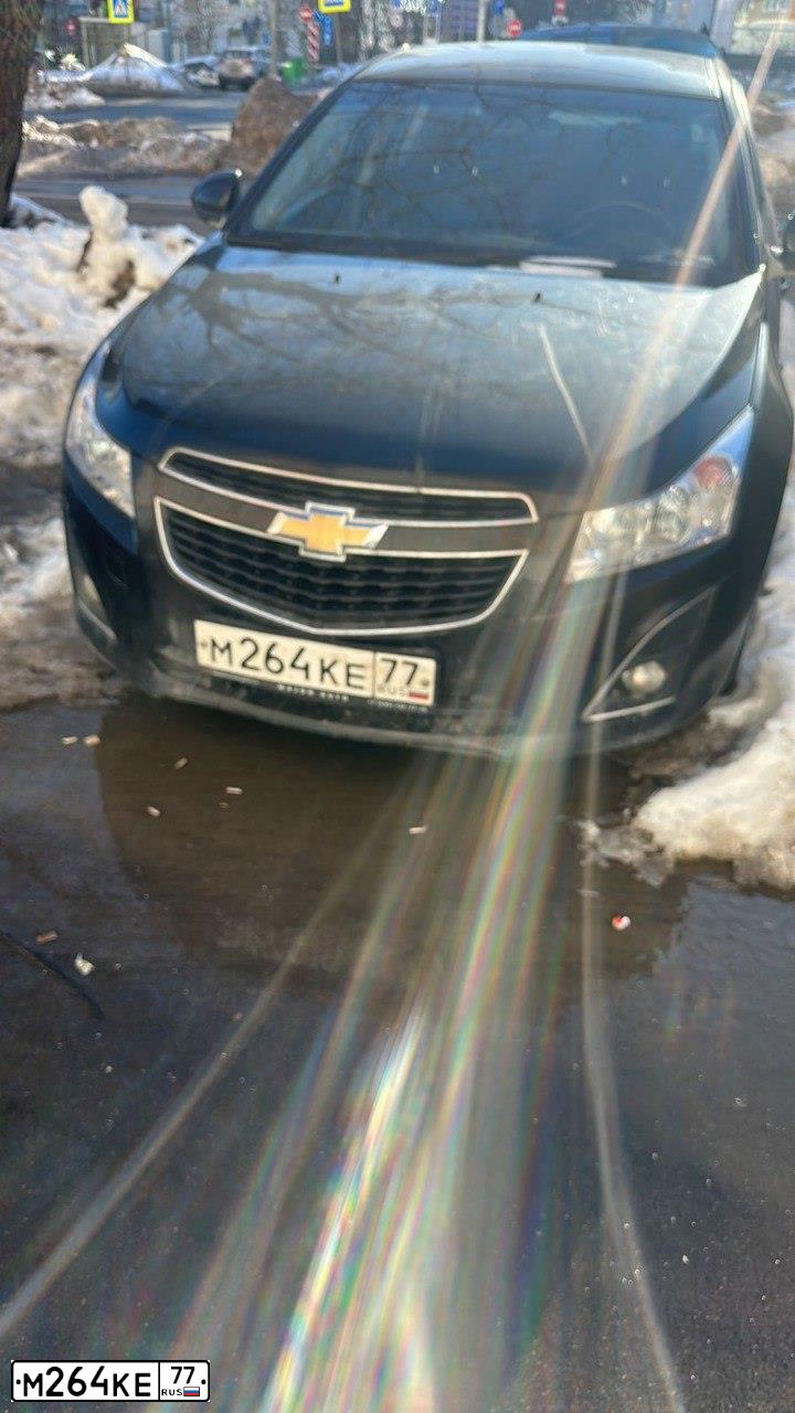 Фото автомобиля CHEVROLET CRUZE, 2013 — госномер М264КЕ77. Цвет: ЧЕРНЫЙ