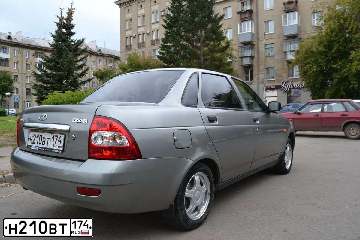 Фото автомобиля LADA 2170 PRIORA, 2008 — госномер Н210ВТ174. Цвет: СЕРО-БЕЖЕВЫЙ