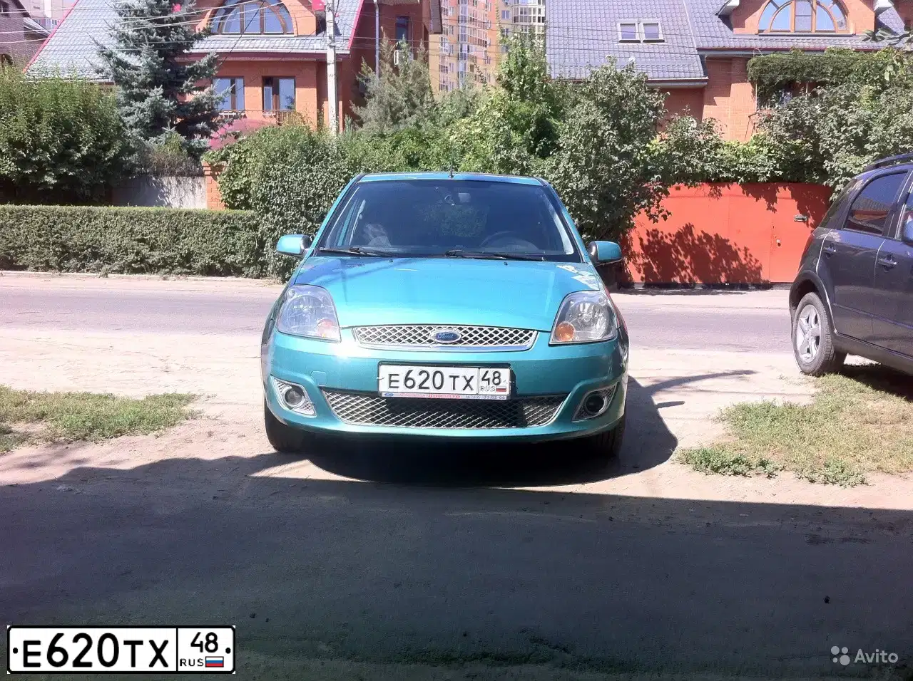 Фото автомобиля FORD FIESTA, 2007 — госномер М215ЕС164. Цвет: Темно-зеленый