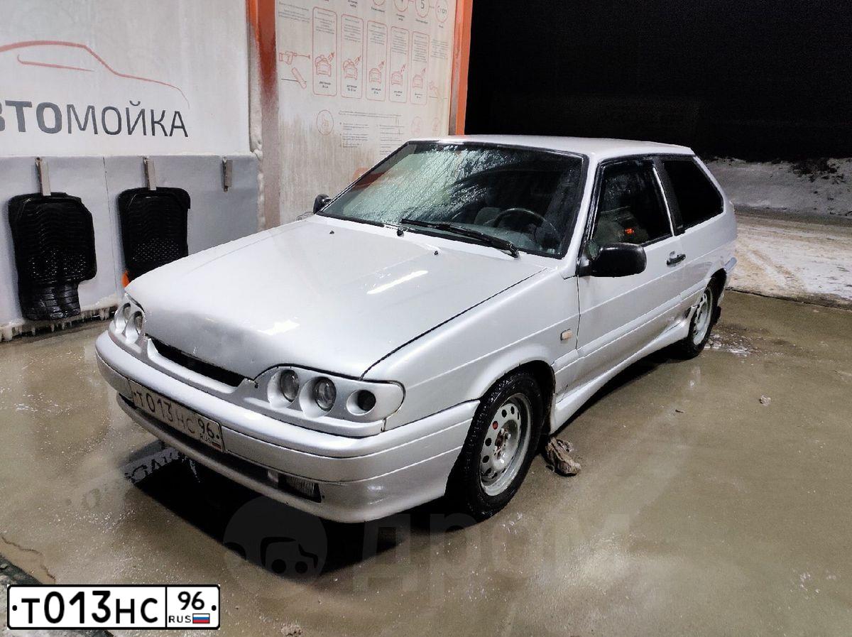 Фото автомобиля LADA 2113 SAMARA, 2007 — госномер Т013НС96. Цвет: СВЕТЛО-СЕРЫЙ