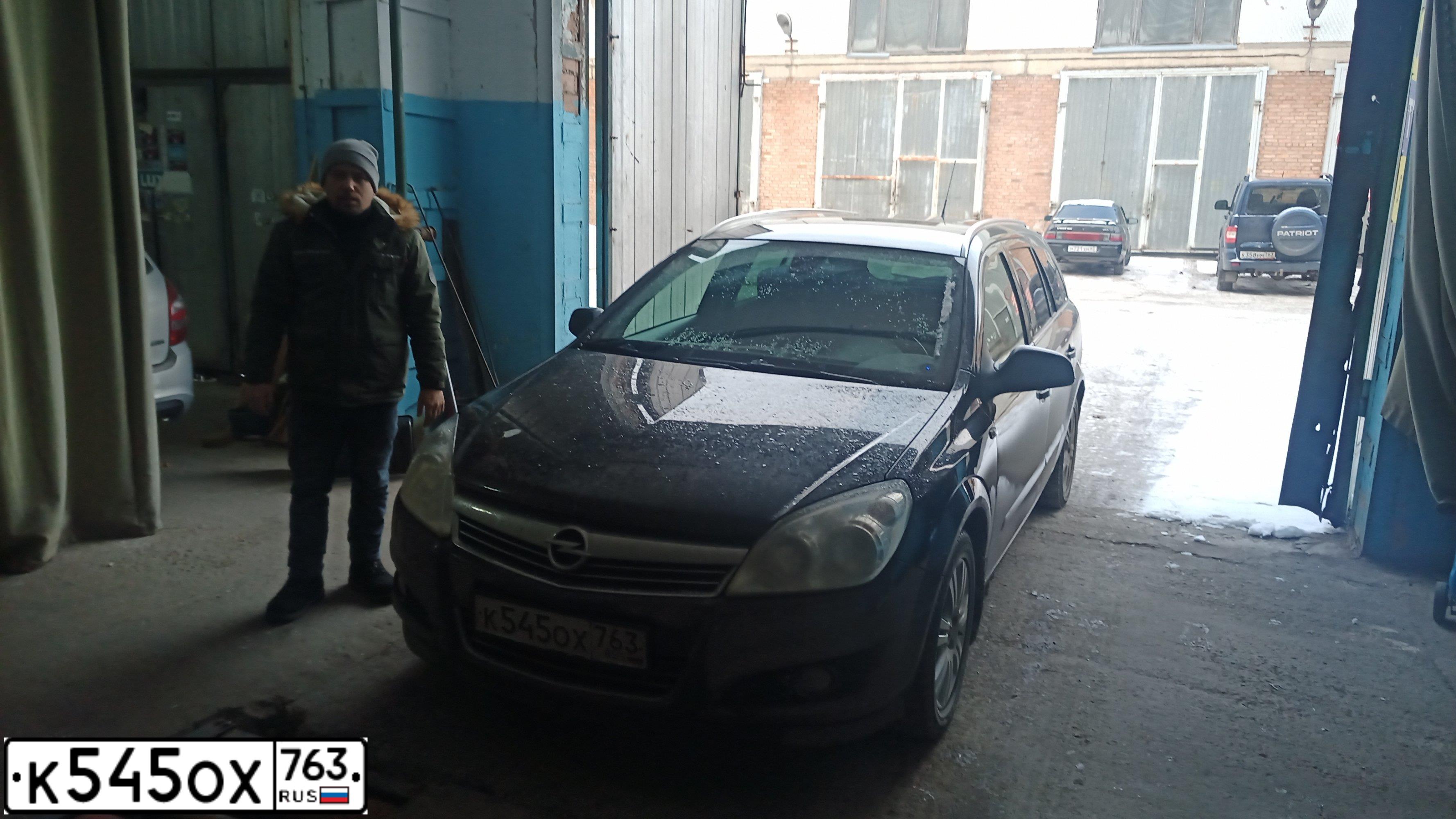 Фото автомобиля OPEL ASTRA, 2011 — госномер Х706РХ52. Цвет: ЧЕРНЫЙ