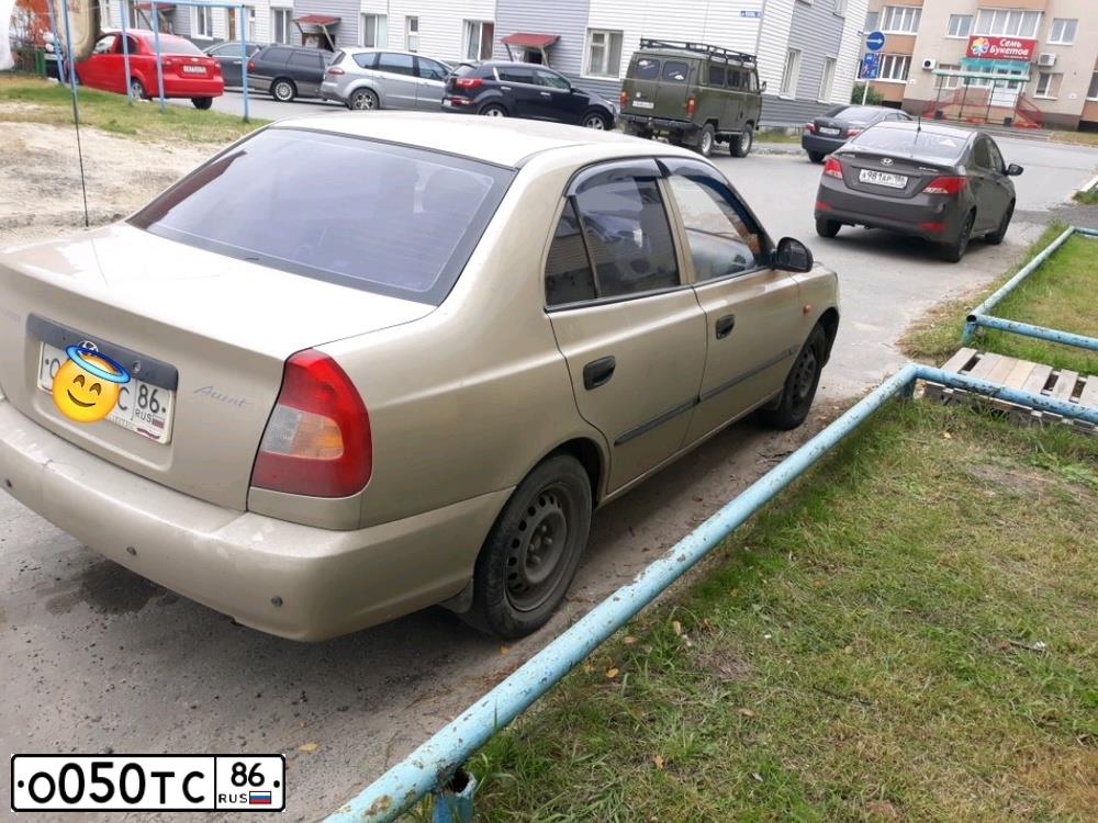 Фото автомобиля TAGAZ ACCENT, 2005 — госномер О050ТС86. Цвет: ЖЁЛТЫЙ