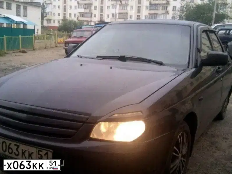 Фото автомобиля LADA 2172 PRIORA, 2009 — госномер Х063КК51. Цвет: Сине-Черный