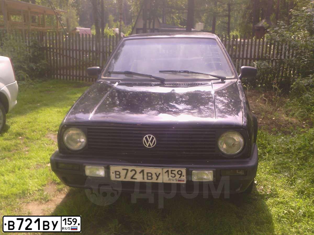 Фото автомобиля VOLKSWAGEN GOLF, 1986 — госномер Т140ЕЕ196. Цвет: ЧЕРНЫЙ
