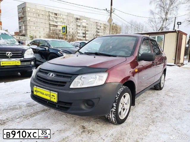 Фото автомобиля LADA 2190 GRANTA, 2012 — госномер В910ХС35. Цвет: СЕРЕБРИСТО-КРАСНЫЙ