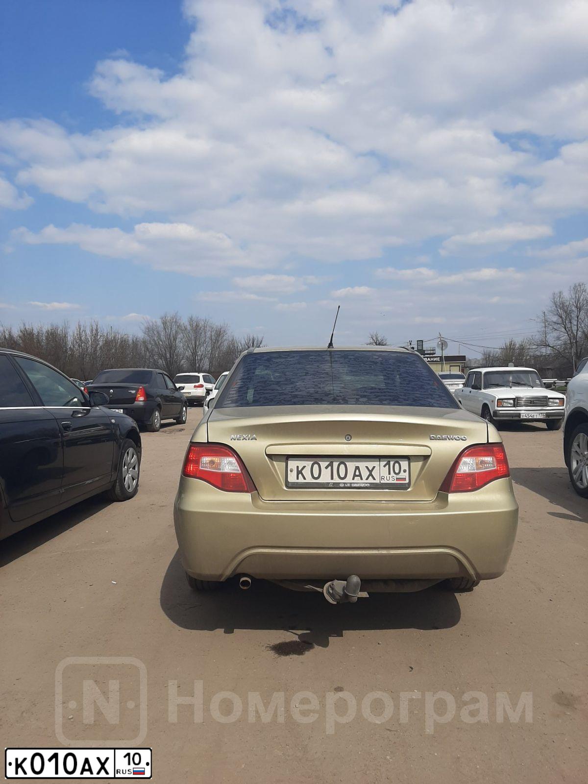 Фото автомобиля LADA 2107, 2006 — госномер К010АХ10. Цвет: ТЕМНО - ВИШНЕВЫЙ