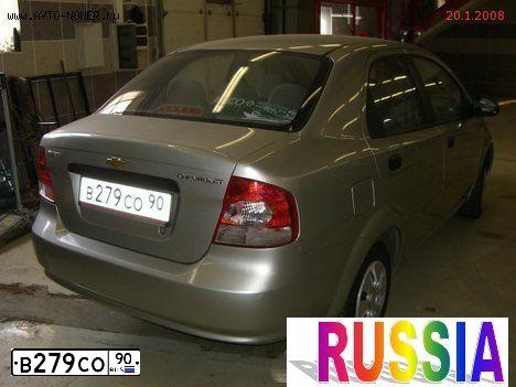 Фото автомобиля CHEVROLET AVEO, 2004 — госномер В310ХК53. Цвет: СЕРЫЙ