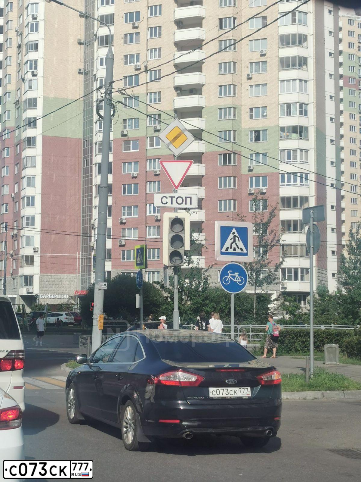Фото автомобиля FORD MONDEO, 2011 — госномер С073СК777. Цвет: ЧЕРНЫЙ