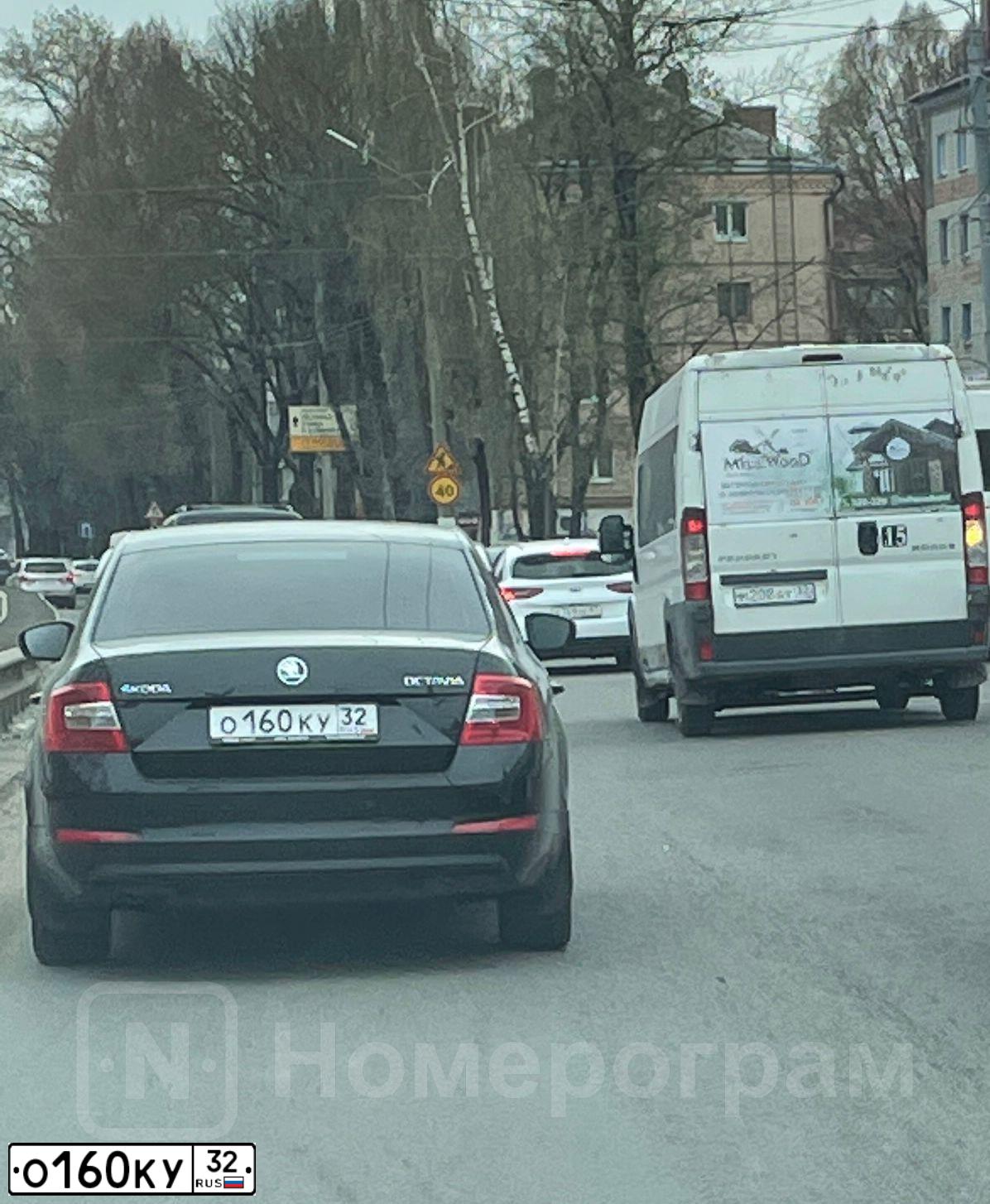 Фото автомобиля SKODA OCTAVIA, 2014 — госномер О160КУ32. Цвет: ЧЕРНЫЙ