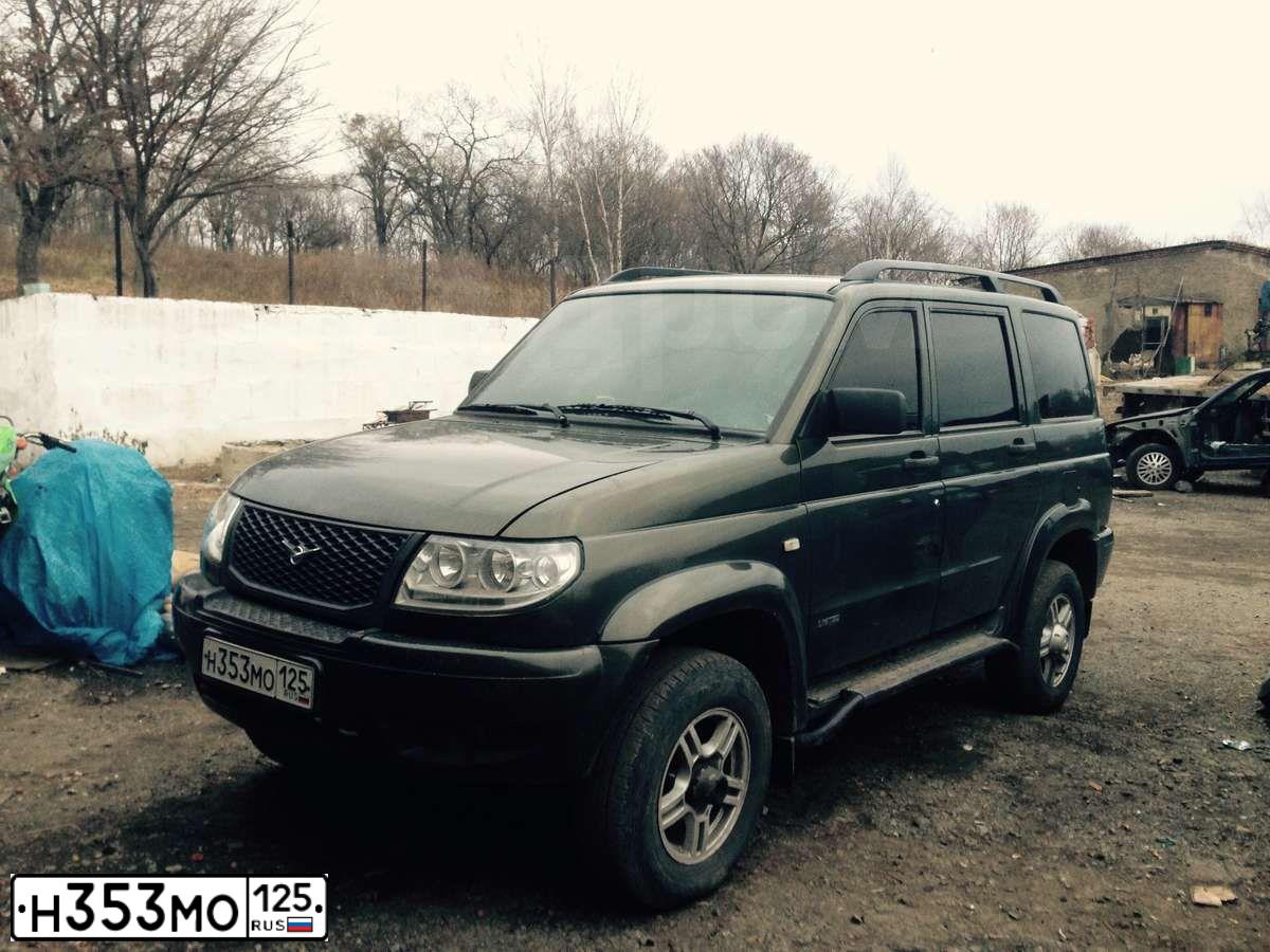 Фото автомобиля UAZ 3163 PATRIOT, 2011 — госномер Н353МО125. Цвет: ЗОЛОТИСТЫЙ МЕТАЛЛИК