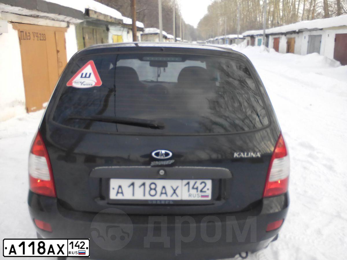 Фото автомобиля LADA 1117 KALINA, 2012 — госномер А118АХ142. Цвет: Сине-Черный