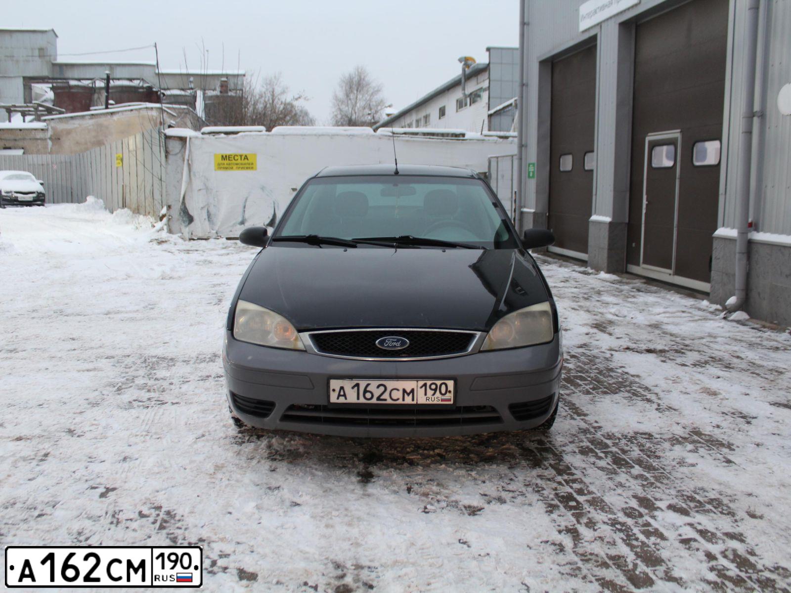 Фото автомобиля FORD FOCUS, 2005 — госномер О199ХР76. Цвет: ЧЕРНЫЙ
