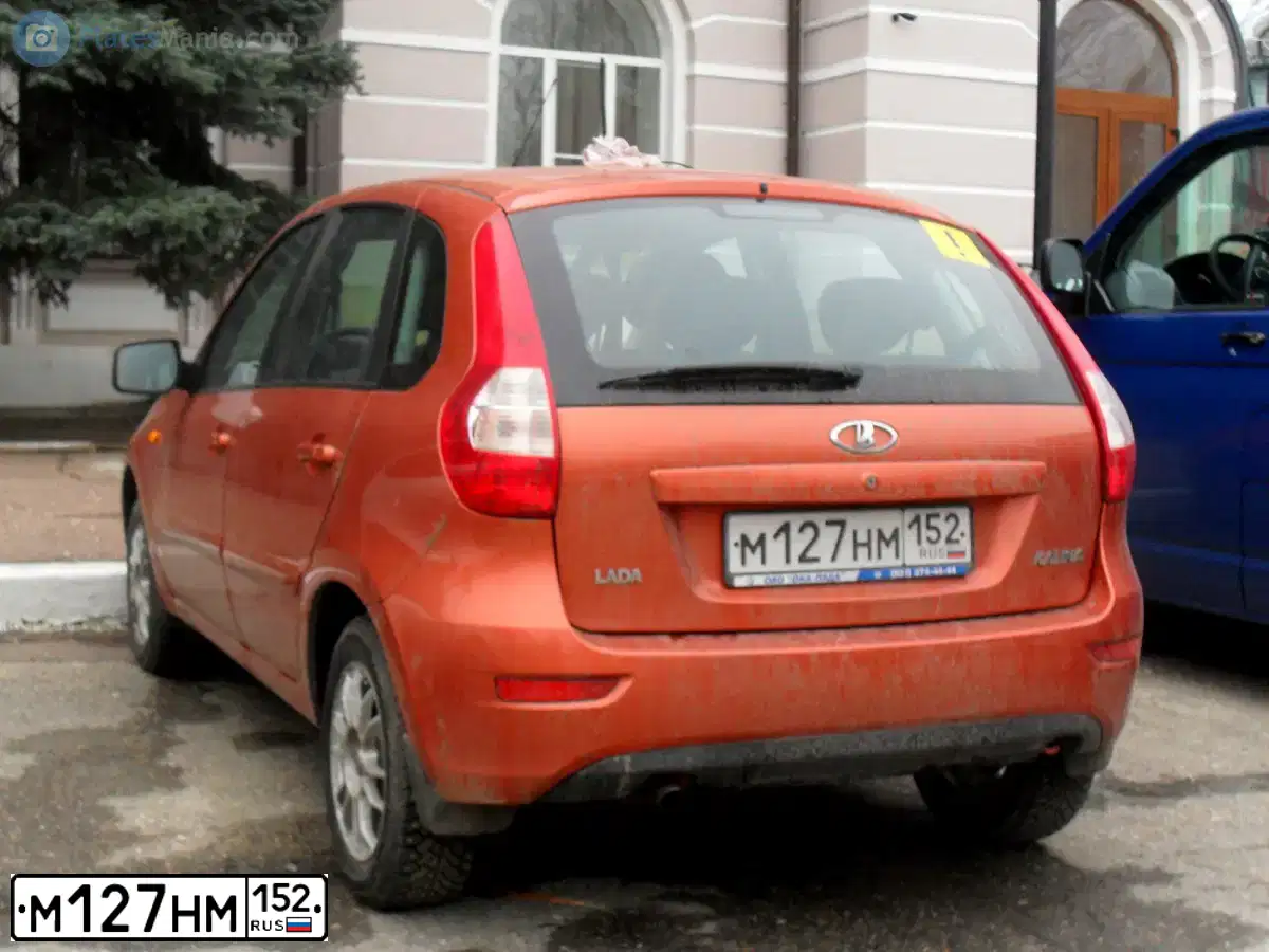 Фото автомобиля LADA 2192 KALINA, 2013 — госномер М127НМ152. Цвет: ОРАНЖЕВЫЙ