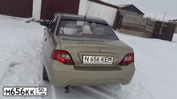 Фото автомобиля KIA SORENTO, 2006 — госномер М656КК50. Цвет: ЧЕРНЫЙ