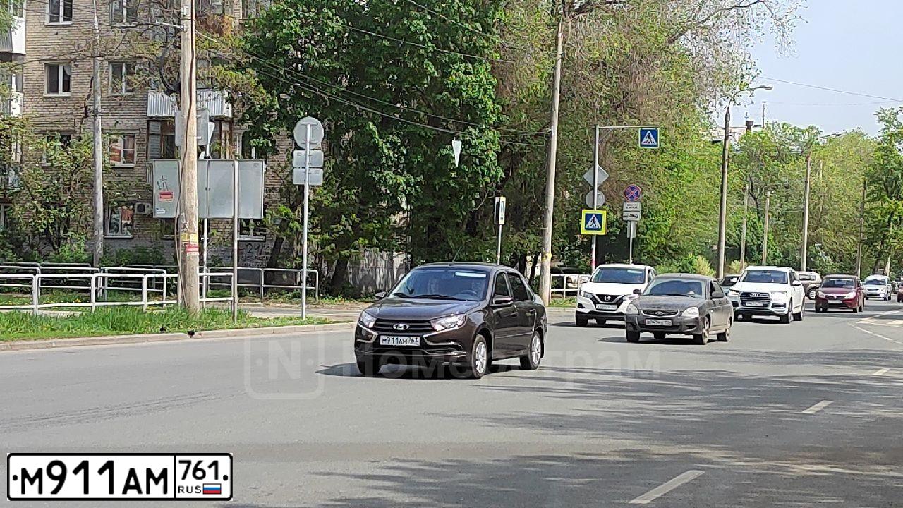 Фото автомобиля VOLKSWAGEN TOUAREG, 2013 — госномер М911АМ761. Цвет: Белый