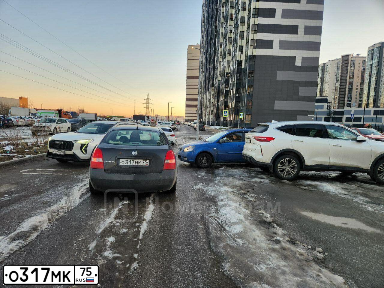 Фото автомобиля NISSAN PRIMERA, 2002 — госномер О317МК75. Цвет: ЧЕРНЫЙ