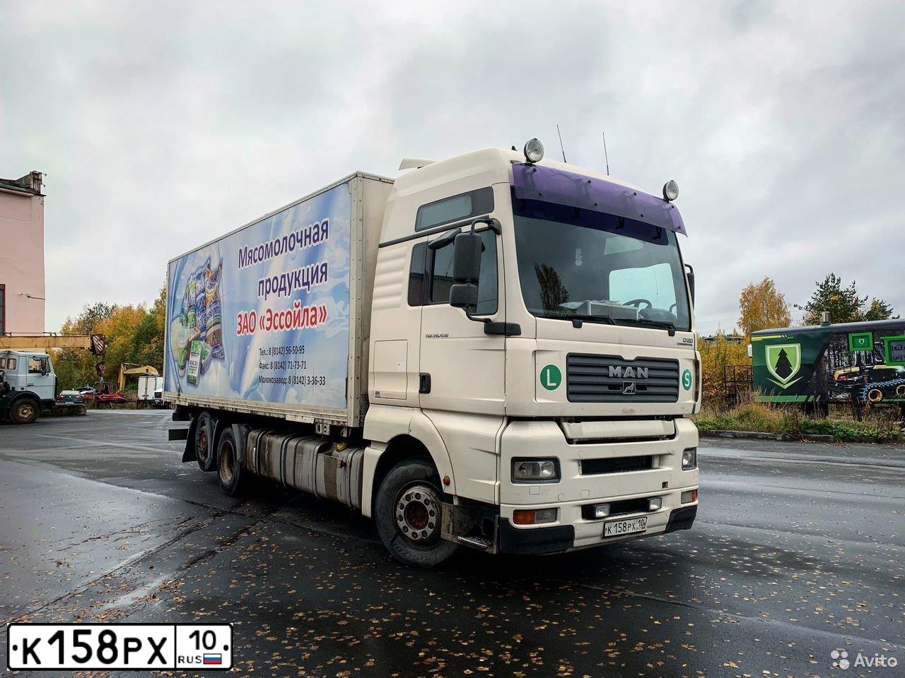Фото автомобиля MAN TGA 26.XXX /6X2/, 2005 — госномер К017РЕ35. Цвет: Белый
